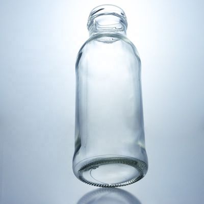 Garrafa de bebida de vidro transparente Popular 100ml260ml 500ml 1000ml garrafa redonda com tampa de parafuso