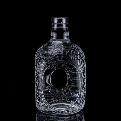 Vidro redondo esculpido 700ml 750ml Vodka garrafa de vidro garrafa de vinho com tipo de vedação de cortiça