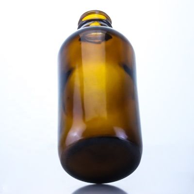 Garrafa de cerveja de vidro vazia de 350 ml com cortina de seda e estampagem a quente