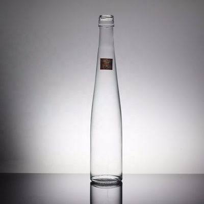 Garrafa de vidro de água mineral transparente redonda de 700 ml 350 ml personalizada para bebidas industriais