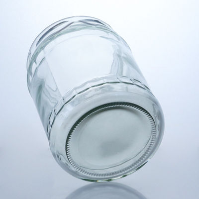 Garrafa de vidro de pedra redonda transparente para produção e distribuição de alimentos