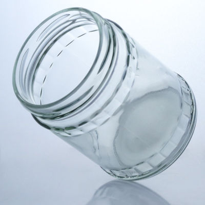 Garrafa de vidro de pedra redonda transparente para produção e distribuição de alimentos