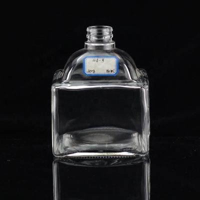 Garrafa de vidro industrial de 700 ml para a indústria de bebidas em forma de polegar