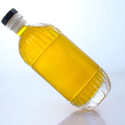 Garrafa de vidro para bebidas industriais com desenho em relevo e forma redonda de cortiça