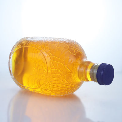 Forma redonda única em relevo de qualidade alimentar rum vodka uísque tequila gin garrafa de vidro com cortiça perfeita