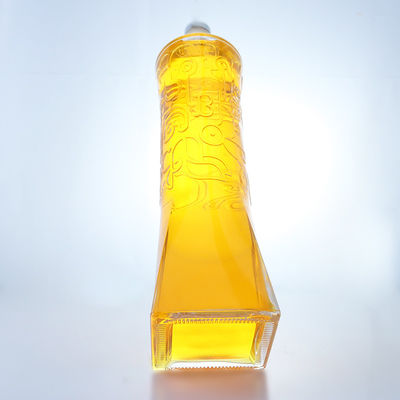 Garrafa de vidro para bebidas industriais com forma única e material de pedra em relevo