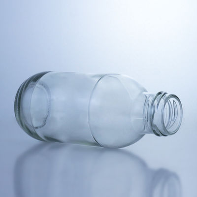 Solução de armazenamento de líquido Solução de armazenamento de 300 ml de garrafa de vidro redonda de leite com tampa