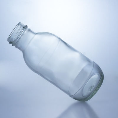 Solução de armazenamento de líquido Solução de armazenamento de 300 ml de garrafa de vidro redonda de leite com tampa