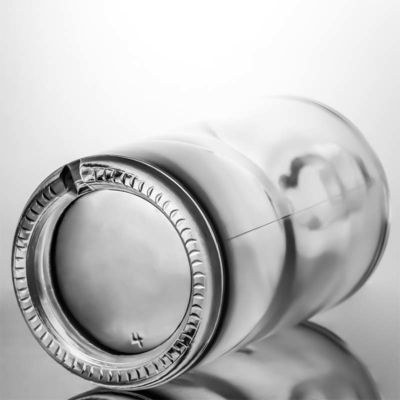 Material do colarinho Vidro 750 ml Botella de pedra transparente em forma redonda para Gin Rum personalizado